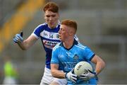 19 July 2019; Seán Lambe of Dublin in action against Dan McCormack of Laois during the EirGrid Leinster GAA Football U20 Championship Final match between Laois and Dublin at Bord na Móna O’Connor Park in Tullamore, Co Offaly. Photo by Piaras Ó Mídheach/Sportsfile
