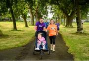 20 July 2019; David Gillick, left, with Candi, right, and Bronwyn O'Reilly during the Fairview parkrun where Vhi hosted a special event to celebrate their partnership with parkrun Ireland. Vhi ambassador and Olympian David Gillick was on hand to lead the warm up for parkrun participants before completing the 5km free event. Parkrunners enjoyed refreshments post event at the Vhi Rehydrate, Relax, Refuel and Reward areas. parkrun in partnership with Vhi support local communities in organising free, weekly, timed 5k runs every Saturday at 9.30am. Photo by David Fitzgerald/Sportsfile