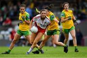 20 July 2019; Joannne Barrett of Tyrone in action against Geraldine McLaughlin of Donegal, centre, during the TG4 All-Ireland Ladies Football Senior Championship Group 4 Round 2 match between Donegal and Tyrone at TEG Cusack Park in Mullingar, Co. Westmeath. Photo by Piaras Ó Mídheach/Sportsfile