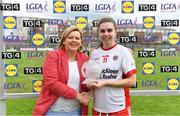 20 July 2019; Maria Canavan of Tyrone receives the Player of the Match award from Marie Hickey, President, LGFA, following the TG4 All-Ireland Ladies Football Senior Championship Group 4 Round 2 match between Donegal and Tyrone at TEG Cusack Park in Mullingar, Co. Westmeath. Photo by Piaras Ó Mídheach/Sportsfile