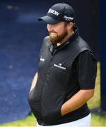 20 July 2019; Shane Lowry of Ireland walks out to the 1st tee during Day Three of the 148th Open Championship at Royal Portrush in Portrush, Co Antrim. Photo by Ramsey Cardy/Sportsfile