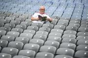 20 July 2019; A Tyrone supporter inspects the programme prior to the GAA Football All-Ireland Senior Championship Quarter-Final Group 2 Phase 2 match between Cork and Tyrone at Croke Park in Dublin. Photo by David Fitzgerald/Sportsfile