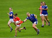 20 July 2019; Melissa Duggan of Cork gets away from Laura Fitzpatrick of Cavan during the TG4 All-Ireland Ladies Football Senior Championship Group 2 Round 2 match between Cork and Cavan at TEG Cusack Park in Mullingar, Co. Westmeath. Photo by Piaras Ó Mídheach/Sportsfile