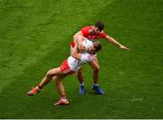 20 July 2019; Niall Sludden of Tyrone in action against Tomás Clancy of Cork during the GAA Football All-Ireland Senior Championship Quarter-Final Group 2 Phase 2 match between Cork and Tyrone at Croke Park in Dublin. Photo by Seb Daly/Sportsfile