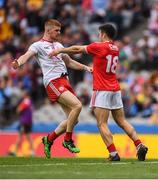 20 July 2019; Cathal McShane of Tyrone is pushed by Stephen Cronin of Cork as he celebrates after scoring his side's second goal during the GAA Football All-Ireland Senior Championship Quarter-Final Group 2 Phase 2 match between Cork and Tyrone at Croke Park in Dublin. Photo by David Fitzgerald/Sportsfile