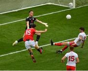 20 July 2019; Luke Connolly of Cork shoots wide under pressure from Niall Morgan, left, and Ronan McNamee of Tyrone during the GAA Football All-Ireland Senior Championship Quarter-Final Group 2 Phase 2 match between Cork and Tyrone at Croke Park in Dublin. Photo by Seb Daly/Sportsfile