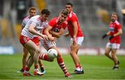 20 July 2019; Rory Brennan of Tyrone in action against Ian Magure of Cork during the GAA Football All-Ireland Senior Championship Quarter-Final Group 2 Phase 2 match between Cork and Tyrone at Croke Park in Dublin. Photo by David Fitzgerald/Sportsfile