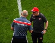 20 July 2019; Tyrone manager Mickey Harte, right, and Cork manager Ronan McCarthy shake hands following the GAA Football All-Ireland Senior Championship Quarter-Final Group 2 Phase 2 match between Cork and Tyrone at Croke Park in Dublin. Photo by Seb Daly/Sportsfile