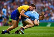 20 July 2019; Con O'Callaghan of Dublin is tackled by Sean Mullooly of Roscommon during the GAA Football All-Ireland Senior Championship Quarter-Final Group 2 Phase 2 match between Dublin and Roscommon at Croke Park in Dublin. Photo by Ray McManus/Sportsfile