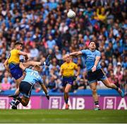 20 July 2019; Fintan Cregg of Roscommon has his shot blocked by Philip McMahon of Dublin during the GAA Football All-Ireland Senior Championship Quarter-Final Group 2 Phase 2 match between Dublin and Roscommon at Croke Park in Dublin. Photo by David Fitzgerald/Sportsfile