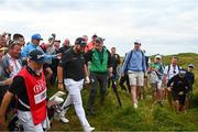 20 July 2019; Shane Lowry of Ireland after playing his second shot on the 14th during Day Three of the 148th Open Championship at Royal Portrush in Portrush, Co Antrim. Photo by Ramsey Cardy/Sportsfile