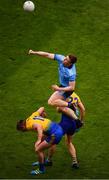 20 July 2019; John Small of Dublin in action against Cathal Cregg, left, and Colin Compton of Roscommon during the GAA Football All-Ireland Senior Championship Quarter-Final Group 2 Phase 2 match between Dublin and Roscommon at Croke Park in Dublin. Photo by Seb Daly/Sportsfile
