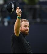 20 July 2019; Shane Lowry of Ireland acknowledges the gallery on the 18th green after putting to finish his round during Day Three of the 148th Open Championship at Royal Portrush in Portrush, Co Antrim. Photo by Ramsey Cardy/Sportsfile