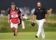 20 July 2019; Shane Lowry of Ireland acknowledges the gallery as he walks up to the 18th green during Day Three of the 148th Open Championship at Royal Portrush in Portrush, Co Antrim. Photo by Ramsey Cardy/Sportsfile