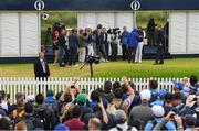 20 July 2019; Spectators watch on as Shane Lowry of Ireland conducts interviews following his round on Day Three of the 148th Open Championship at Royal Portrush in Portrush, Co Antrim. Photo by Ramsey Cardy/Sportsfile