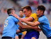 20 July 2019; Enda Smith of Roscommon in action against Brian Fenton, left, and Eric Lowndes of Dublin during the GAA Football All-Ireland Senior Championship Quarter-Final Group 2 Phase 2 match between Dublin and Roscommon at Croke Park in Dublin. Photo by Seb Daly/Sportsfile