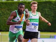 20 July 2019; Brandon Arrey of Raheny Shamrock takes the baton from team-mate Jamie Sheridan before leading his team home to win the Premier Men's 4x400m Relay  during the AAI National League Final at Tullamore Harriers Stadium in Tullamore, Co. Offaly. Photo by Matt Browne/Sportsfile