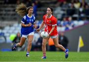 20 July 2019; Eimear Scally of Cork passes under pressure from Ciara Finnegan of Cavan during the TG4 All-Ireland Ladies Football Senior Championship Group 2 Round 2 match between Cork and Cavan at TEG Cusack Park in Mullingar, Co. Westmeath. Photo by Piaras Ó Mídheach/Sportsfile