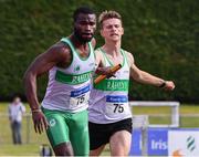 20 July 2019; Brandon Arrey of Raheny Shamrock takes the baton from team-mate Jamie Sheridan before leading his team home to win the Premier Men's 4x400m Relay during the AAI National League Final at Tullamore Harriers Stadium in Tullamore, Co. Offaly. Photo by Matt Browne/Sportsfile