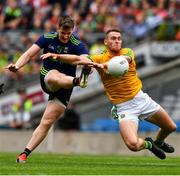 21 July 2019; Cillian O'Connor of Mayo has his shot blocked by Bryan Menton of Meath during the GAA Football All-Ireland Senior Championship Quarter-Final Group 1 Phase 2 match between Mayo and Meath at Croke Park in Dublin. Photo by Ray McManus/Sportsfile