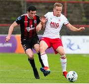 21 July 2019; Simon Madden of St Patrick's Athletic in action against Kevin Devaney of Bohemians during the SSE Airtricity League Premier Division match between Bohemians and St Patrick's Athletic at Dalymount Park in Dublin. Photo by Michael P Ryan/Sportsfile