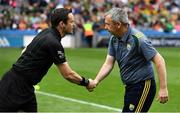 21 July 2019; Kerry manager Peter Keane shakes hands with match referee Paddy Neilan before the GAA Football All-Ireland Senior Championship Quarter-Final Group 1 Phase 2 match between Kerry and Donegal at Croke Park in Dublin. Photo by Ray McManus/Sportsfile