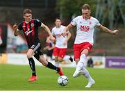 21 July 2019; Ciaran Kelly of St Patrick's Athletic in action against Ryan Swan of Bohemians during the SSE Airtricity League Premier Division match between Bohemians and St Patrick's Athletic at Dalymount Park in Dublin. Photo by Michael P Ryan/Sportsfile