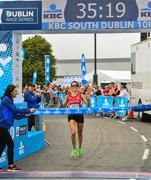 21 July 2019; Breege Connolly, City of Derry Spartan, crosses the finish line to win the Women's race during the KBC & Dublin Marathon Race Series 10k Race at Grange Castle Business Park in Clondalkin, Dublin. Photo by Seb Daly/Sportsfile