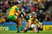 21 July 2019; Paul Geaney of Kerry in action against Frank McGlynn, left, and Stephen McMenamin of Donegal during the GAA Football All-Ireland Senior Championship Quarter-Final Group 1 Phase 2 match between Kerry and Donegal at Croke Park in Dublin. Photo by Ray McManus/Sportsfile