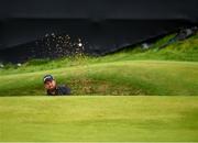21 July 2019; Shane Lowry of Ireland chips from a bunker onto the 13th green during Day Four of the 148th Open Championship at Royal Portrush in Portrush, Co Antrim. Photo by Ramsey Cardy/Sportsfile