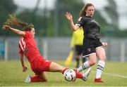21 July 2019; Doireann Fahey of Wexford Youths is tackled by Kate Mooney of Shelbourne during the SÓ Hotels Women's National League Cup Final match between Wexford Youths Women and Shelbourne at Ferrycarrig Park in Wexford. Photo by Harry Murphy/Sportsfile