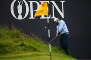 21 July 2019; JB Holmes of USA chips onto the 18th green during Day Four of the 148th Open Championship at Royal Portrush in Portrush, Co Antrim. Photo by Ramsey Cardy/Sportsfile