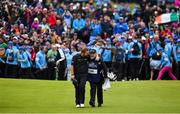 21 July 2019; Shane Lowry of Ireland celebrates with caddy Brian Martin as they walk onto the 18th green on their way to winning The Open Championship on Day Four of the 148th Open Championship at Royal Portrush in Portrush, Co Antrim. Photo by Brendan Moran/Sportsfile Photo by Brendan Moran/Sportsfile