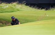 21 July 2019; Shane Lowry of Ireland plays a shot out of the bunker on the 13th hole during Day Four of the 148th Open Championship at Royal Portrush in Portrush, Co Antrim. Photo by John Dickson/Sportsfile