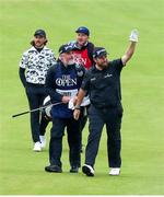 21 July 2019; Shane Lowry of Ireland and caddy Brian Martin make their way to the 18th green during Day Four of the 148th Open Championship at Royal Portrush in Portrush, Co Antrim. Photo by John Dickson/Sportsfile