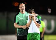 21 July 2019; Republic of Ireland captain Lee O'Connor who picked up a suspension for the semi-final is consoled by assistant coach Colin Healy during the 2019 UEFA U19 European Championship Finals group B match between Republic of Ireland and Czech Republic at the FFA Academy Stadium in Yerevan, Armenia. Photo by Stephen McCarthy/Sportsfile