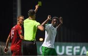 21 July 2019; Jonathan Afolabi of Republic of Ireland receives a yellow card from referee Anastasios Papapetrou during the 2019 UEFA U19 European Championship Finals group B match between Republic of Ireland and Czech Republic at the FFA Academy Stadium in Yerevan, Armenia. Photo by Stephen McCarthy/Sportsfile
