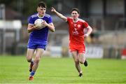 14 July 2019; Jason Irwin of Monaghan gets past Séamus Sweeney of Tyrone during the Electric Ireland Ulster GAA Football Minor Championship Final match between Monaghan and Tyrone at Athletic Grounds in Armagh. Photo by Piaras Ó Mídheach/Sportsfile