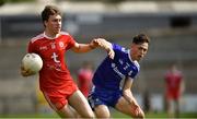 14 July 2019; Mark Devlin of Tyrone gets past Shane Slevin of Monaghan during the Electric Ireland Ulster GAA Football Minor Championship Final match between Monaghan and Tyrone at Athletic Grounds in Armagh. Photo by Piaras Ó Mídheach/Sportsfile