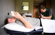 22 July 2019; Republic of Ireland team masseuse Mickey McGlynn works on Mark McGuinness at their team hotel during the 2019 UEFA European U19 Championships in Yerevan, Armenia. Photo by Stephen McCarthy/Sportsfile