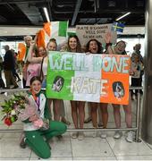 22 July 2019; Kate O’Connor, silver medal winner from the Women's Heptathlon event, with some of her supporters on the return home of Team Ireland from the European Athletics U20 Athletics Championships  at Dublin Airport. Photo by Piaras Ó Mídheach/Sportsfile