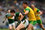 21 July 2019; Seán O'Shea of Kerry is tackled by Paul Brennan of Donegal  during the GAA Football All-Ireland Senior Championship Quarter-Final Group 1 Phase 2 match between Kerry and Donegal at Croke Park in Dublin. Photo by Ray McManus/Sportsfile