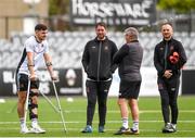 23 July 2019; Injured Dundalk player Jordan Flores, left, in conversation with assistant head coach Ruaidhri Higgins, first team coach John Gill, and opposition analyst Stephen O'Donnell during a Dundalk training session at Oriel Park in Dundalk, Co Louth. Photo by Ben McShane/Sportsfile