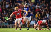 23 July 2019; Kian O'Kelly of Tipperary in action against against James Keating, left, and Sean O'Leary Hayes of Cork on his way to scoring his side's second goal during the Bord Gais Energy Munster GAA Hurling Under 20 Championship Final match between Tipperary and Cork at Semple Stadium in Thurles, Co Tipperary. Photo by Sam Barnes/Sportsfile