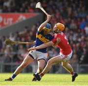 23 July 2019; Conor Bowe of Tipperary in action against James Keating of Cork during the Bord Gais Energy Munster GAA Hurling Under 20 Championship Final match between Tipperary and Cork at Semple Stadium in Thurles, Co Tipperary. Photo by Sam Barnes/Sportsfile