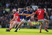 23 July 2019; Kian O'Kelly of Tipperary in action against Robert Downey of Cork during the Bord Gais Energy Munster GAA Hurling Under 20 Championship Final match between Tipperary and Cork at Semple Stadium in Thurles, Co Tipperary. Photo by Sam Barnes/Sportsfile