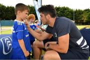 24 July 2019; Leinster's Jimmy O’Brien signs a participant's jersey during the Bank of Ireland Leinster Rugby Summer Camp in St Marys College RFC in Templeogue, Dublin. Photo by Seb Daly/Sportsfile