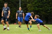 24 July 2019; Leinster players Jimmy O'Brien, left, with participants during the Bank of Ireland Leinster Rugby Summer Camp in St Marys College RFC in Templeogue, Dublin. Photo by Seb Daly/Sportsfile