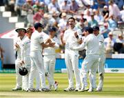 24 July 2019; Boyd Rankin celebrates with his Ireland teammates after a DRS review dissmissal of Stuart Broad of England during day one of the Specsavers Test Match between Ireland and England at Lords Cricket Ground in London, England. Photo by Matt Impey/Sportsfile