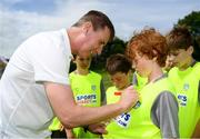 24 July 2019; Republic of Ireland U21 head coach Stephen Kenny signs autographs during a FAI Festival of Football at Duleek FC in Duleek, Co Meath. Photo by Harry Murphy/Sportsfile